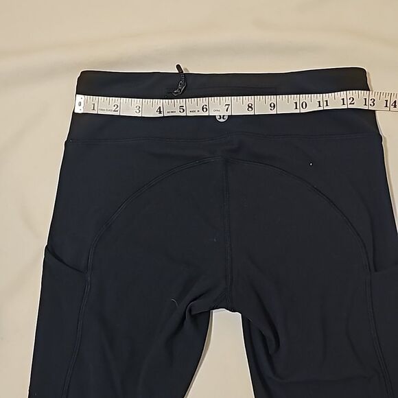 Lulu Lemon blue leggings with side pockets size 4 - Picture 3 of 8